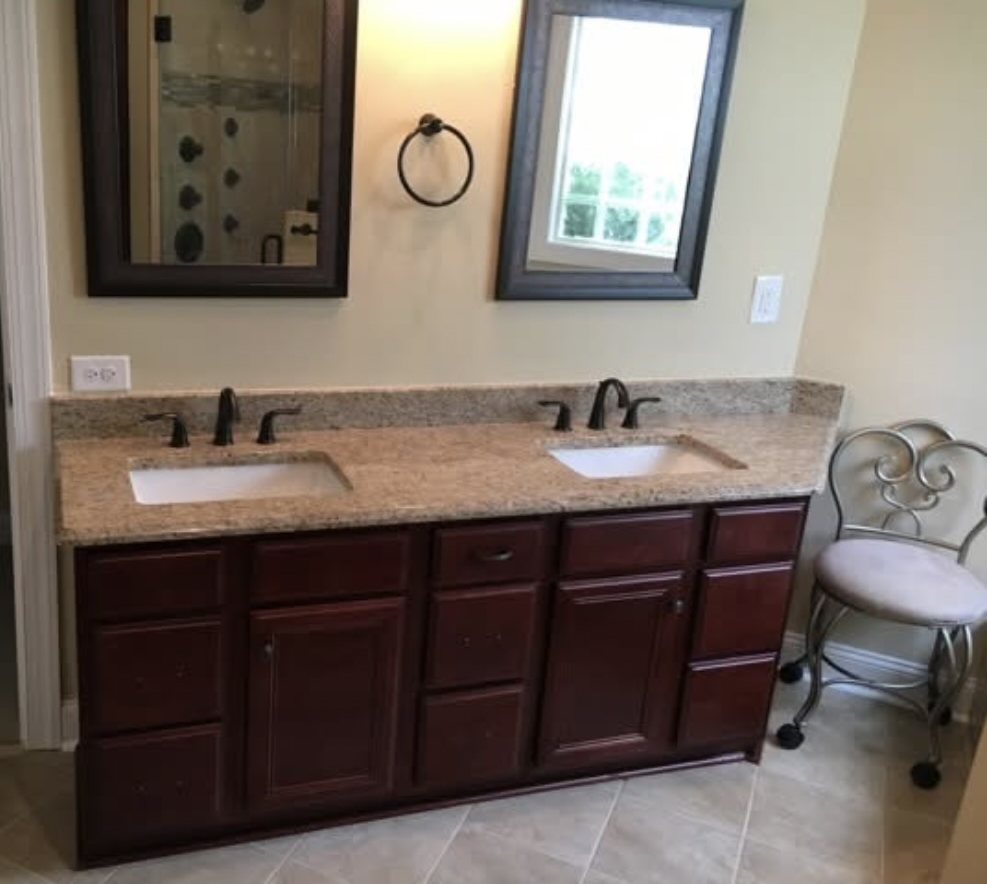 Finished vanity and plumbing fixtures in a new bathroom